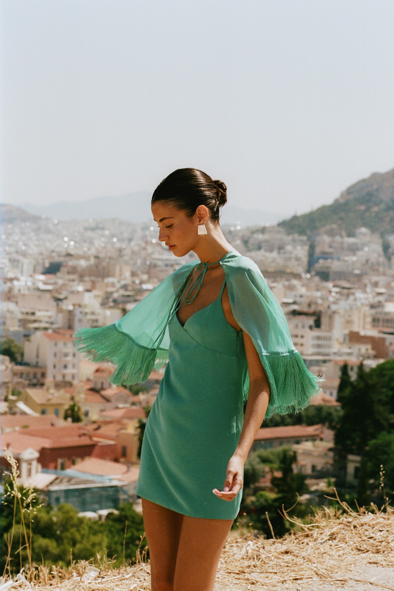 Yellow The Label Facebook ad: Callan Cape Dress, Teal