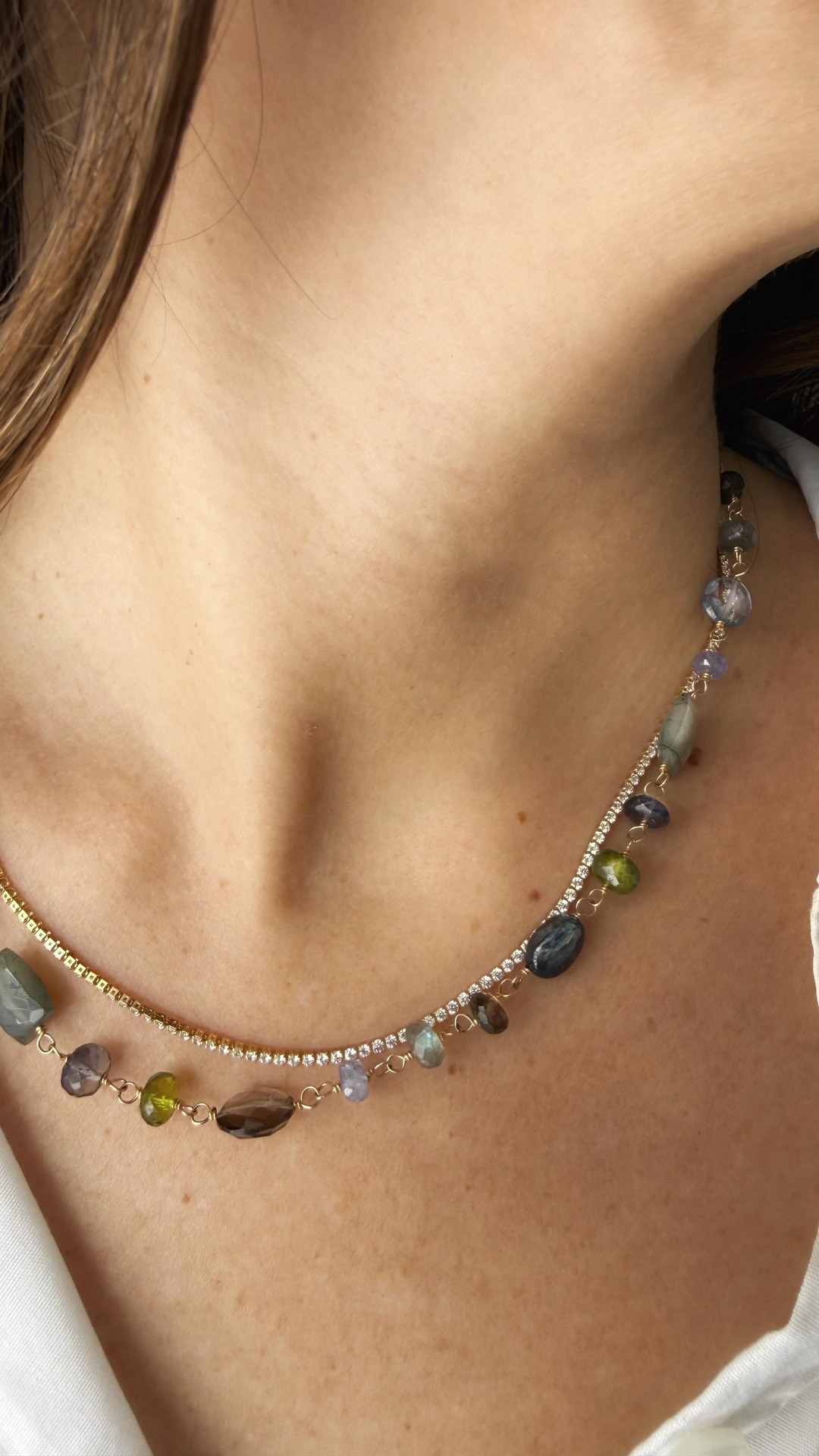 Sarah Cornwell Jewelry Facebook ad: I love a white button down and wide…