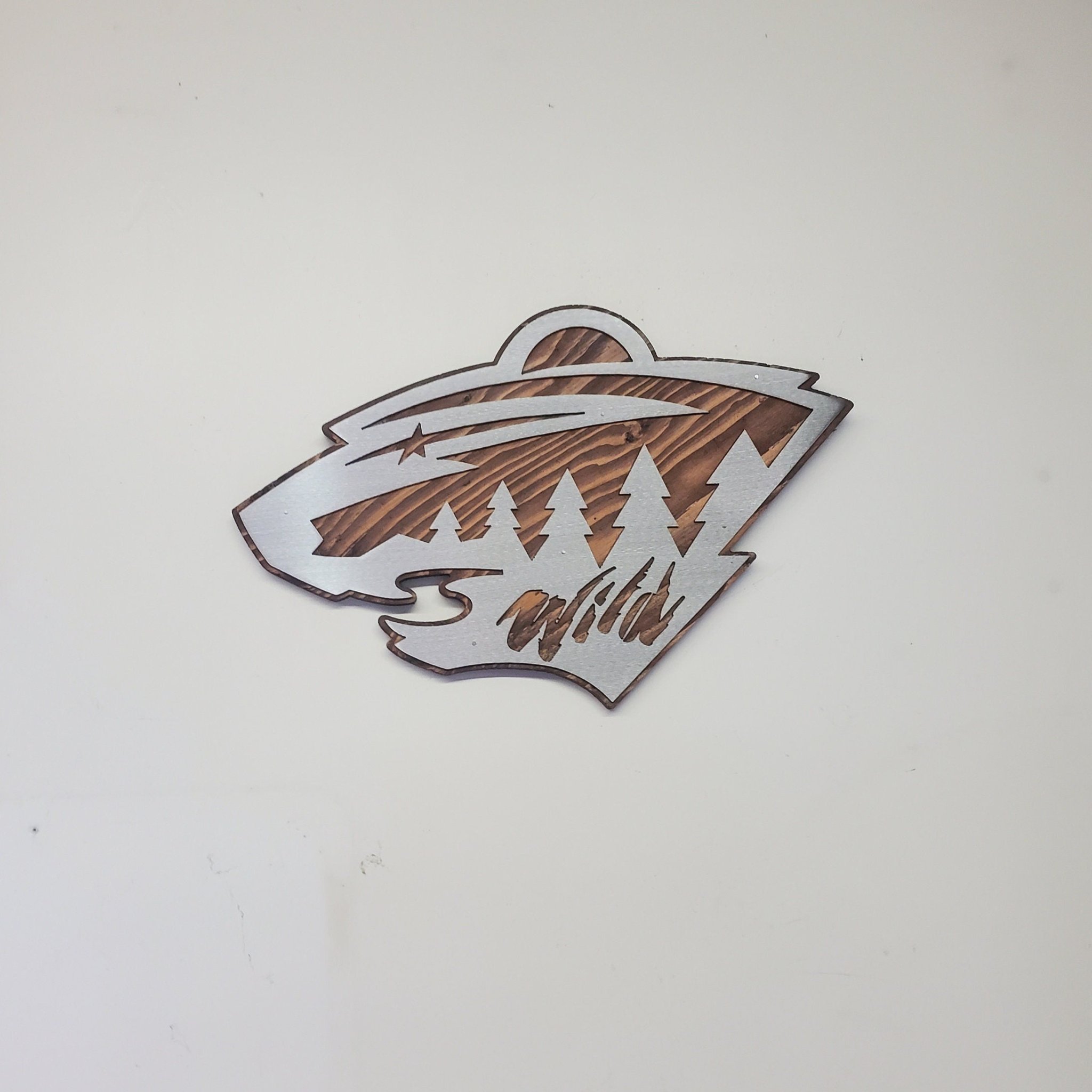 Jason Beamish Facebook ad: Minnesota Wild Metal art on wood home decor MN Hockey sports