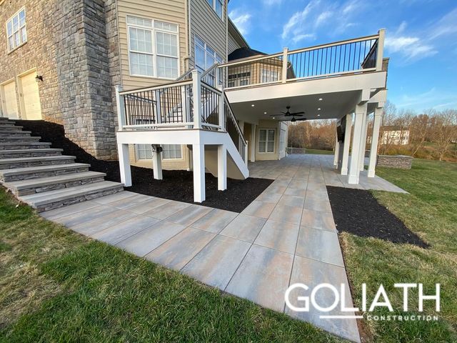 Goliath Construction Facebook ad: We design and build custom decks, patios, porches…