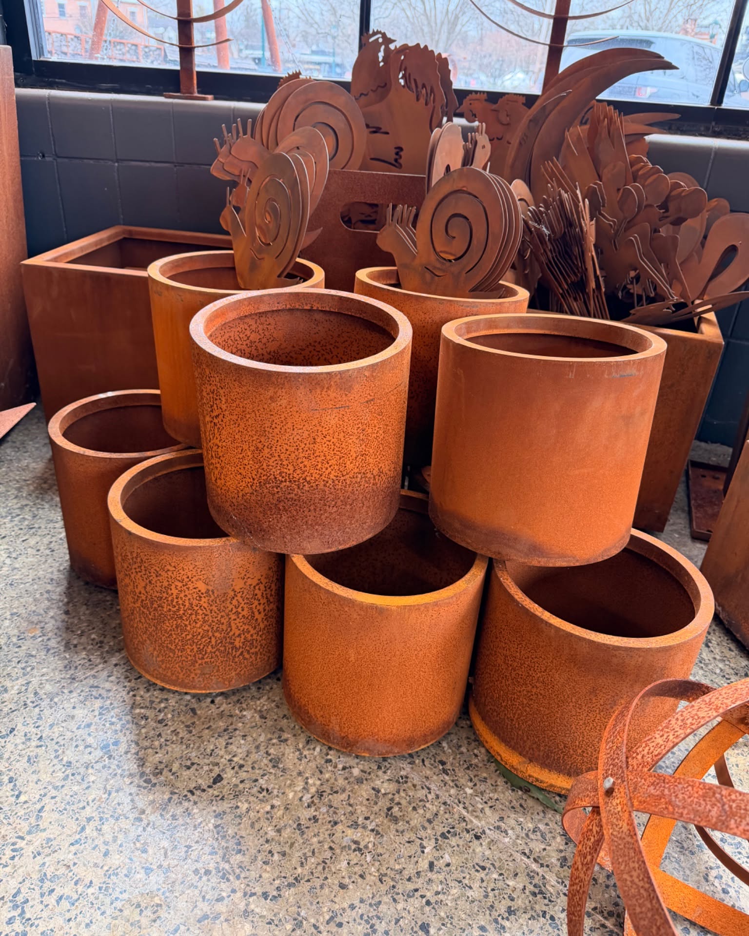 John Rupich Facebook ad: 10 Round Corten Steel Planter