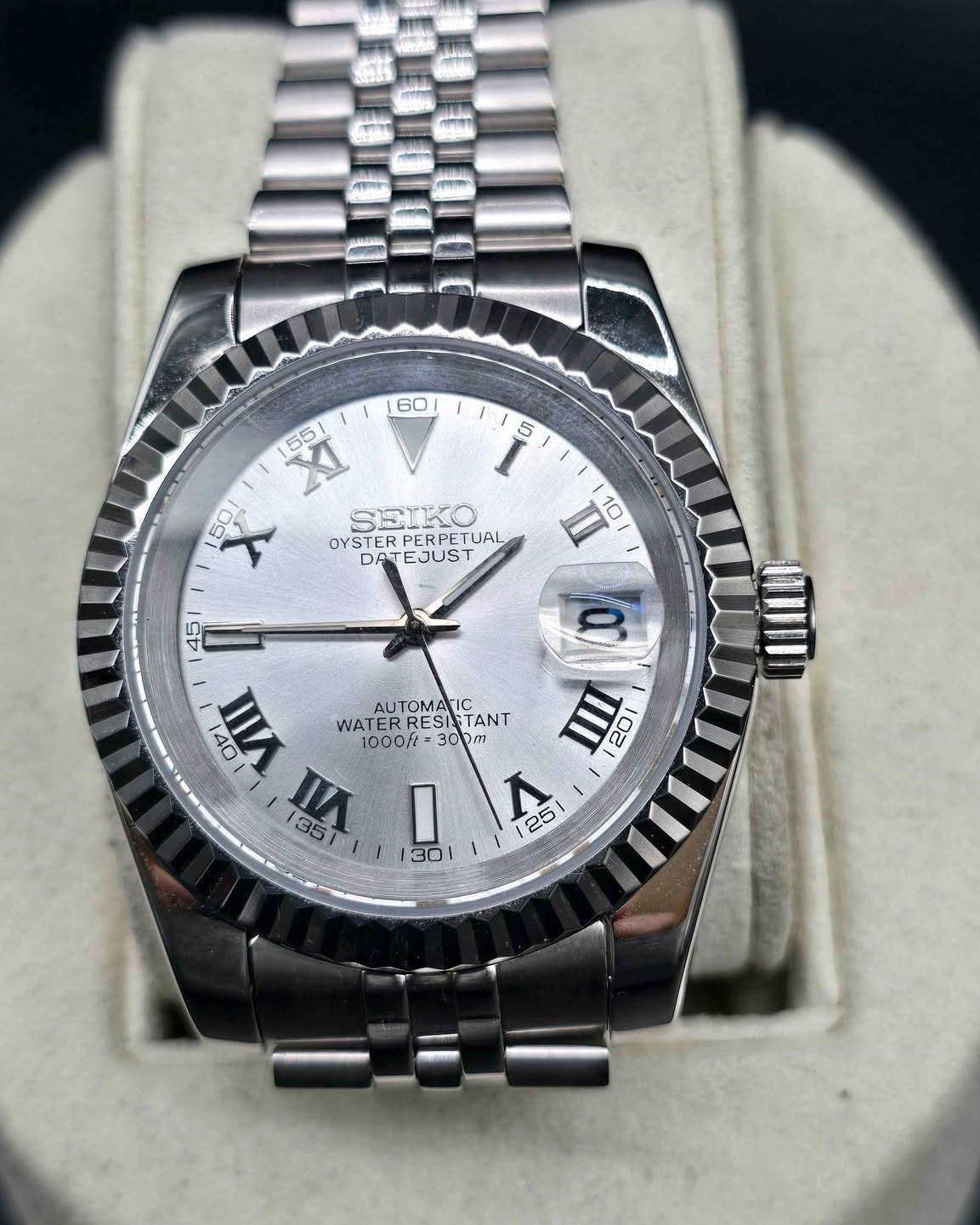 Erik Zwillinger Facebook ad: Custom Built NH35 Tmi Just the Date Mens Automatic Watch.