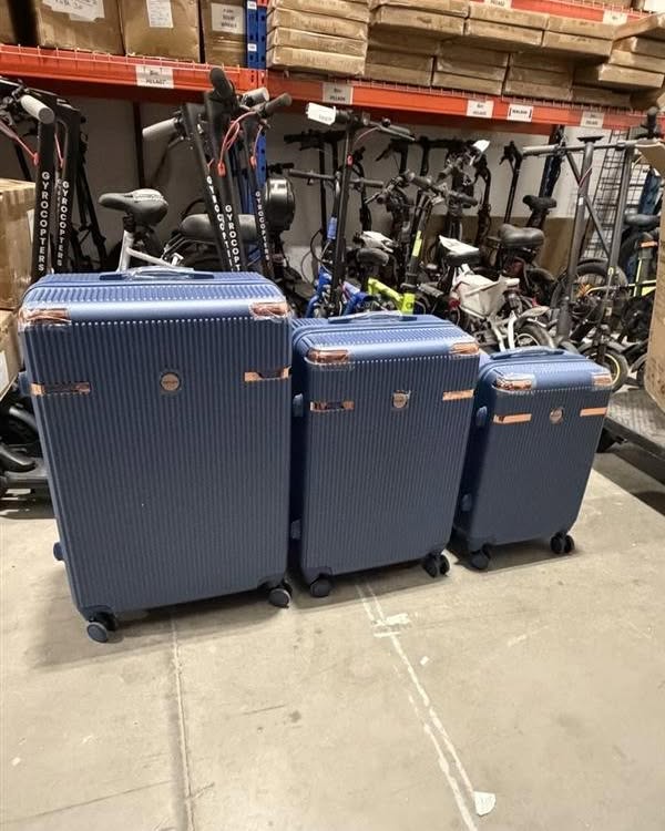 Liam Scott Facebook ad: Hard Shell Luggage Sale, 20/ 24/ 28 + FREE GPS Tracker…