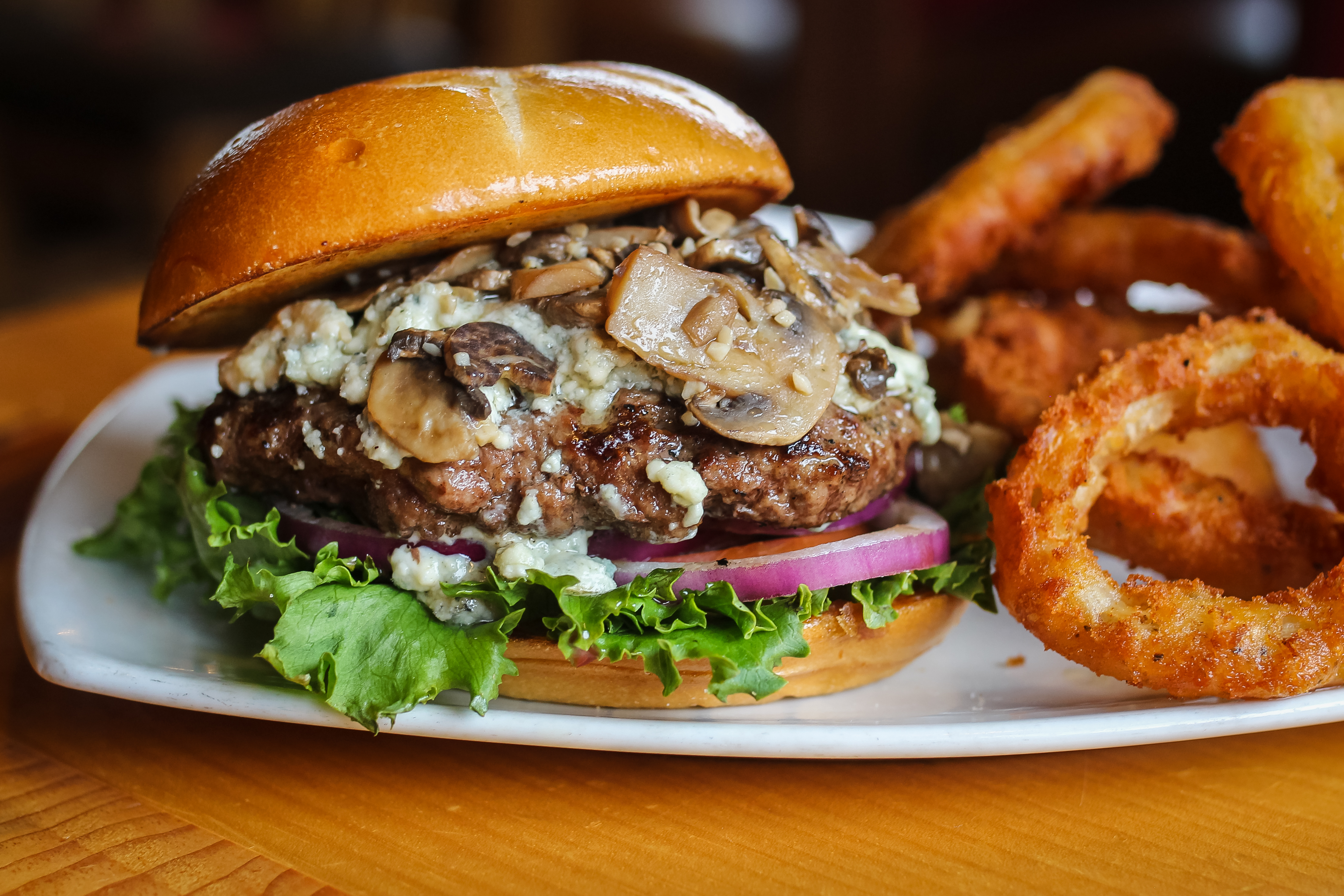 Sweet Lou's Facebook ad: Hand formed Certified Angus Beef burgers is where…