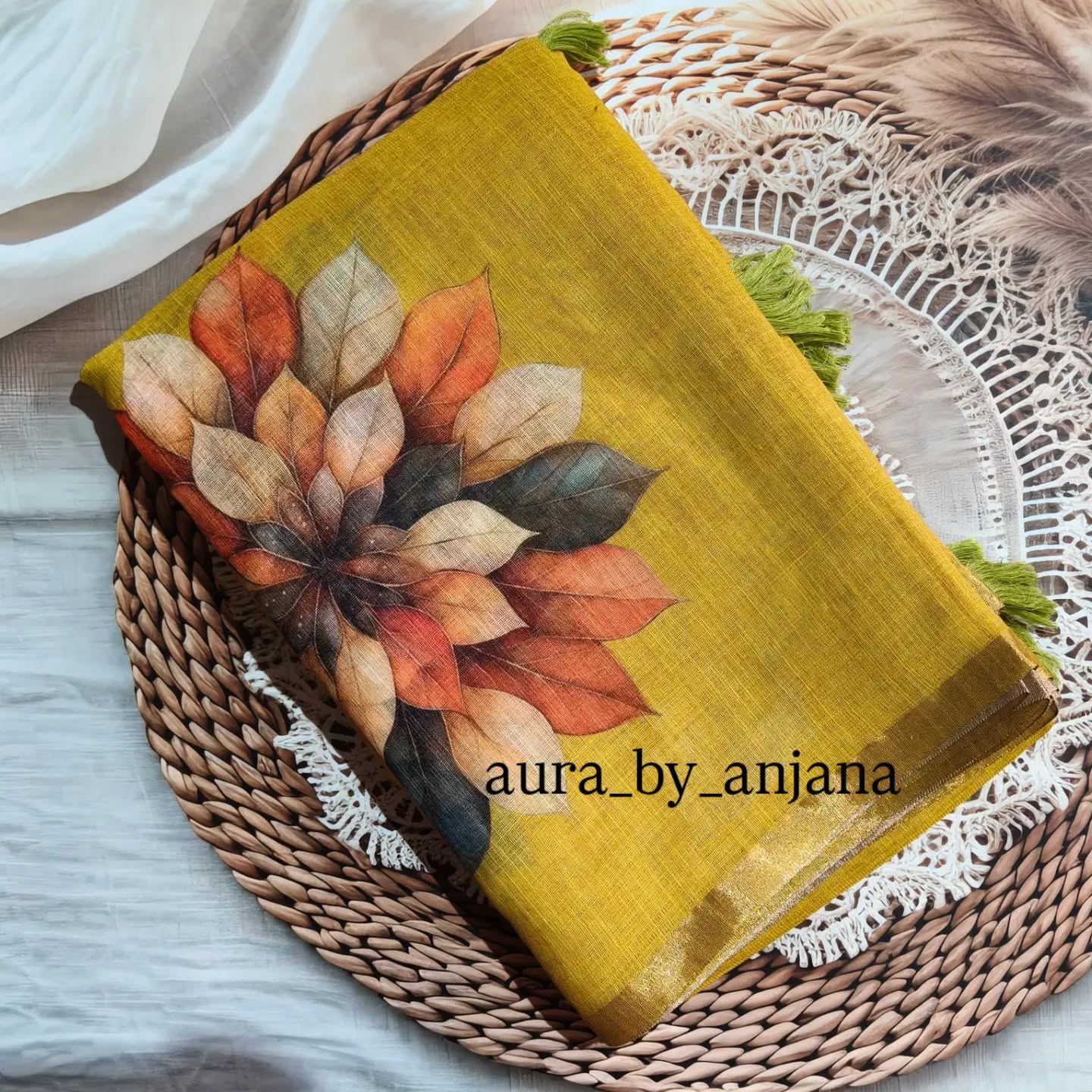 Aura by Anjana Facebook ad: Floral printed linen sarees, blouse attached