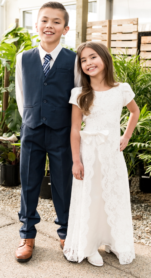White Elegance Facebook ad: Shop the latest White Elegance girl's baptism dresses…