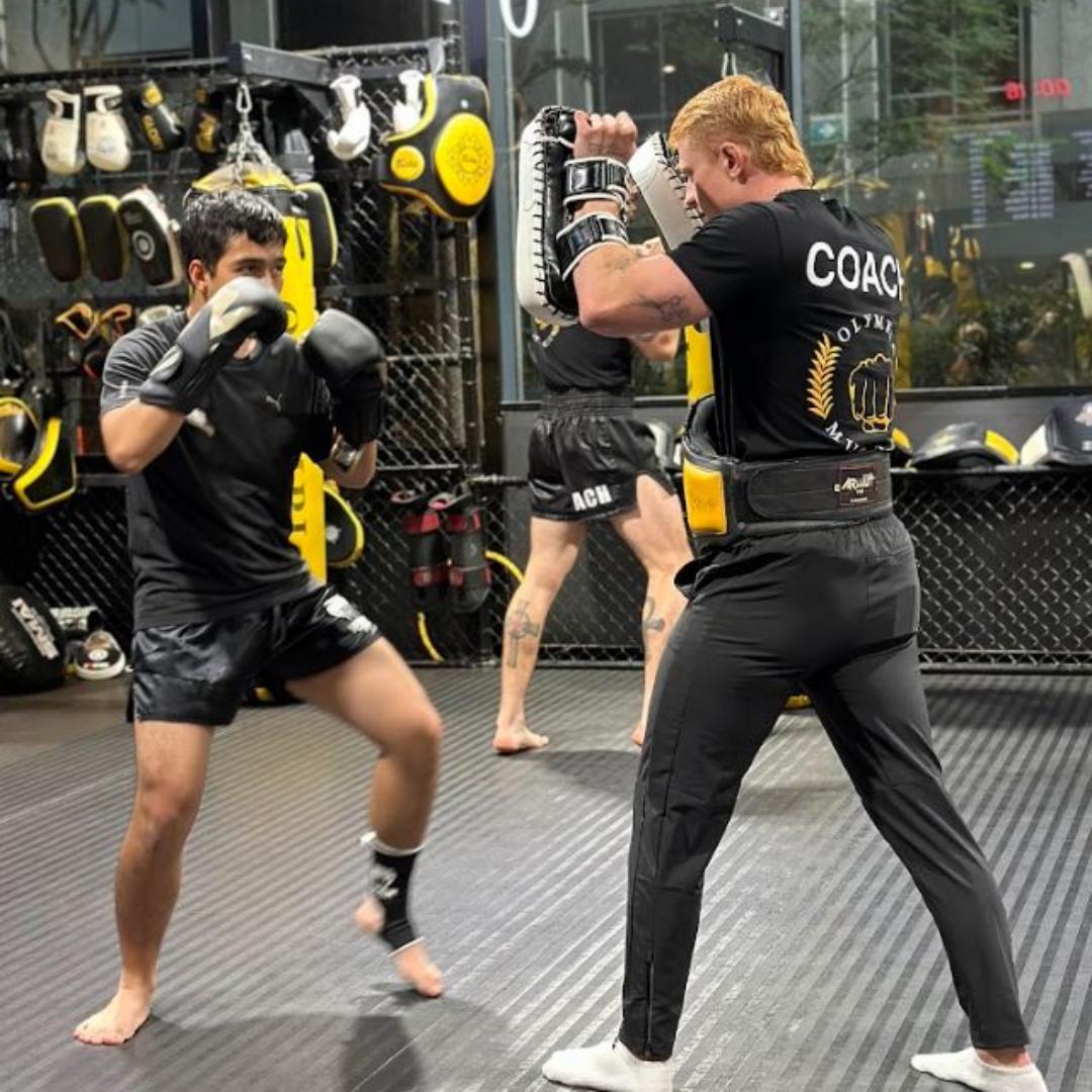 Olympia Transformations - Brisbane CBD Facebook ad: NEVER TRIED MUAY THAI BEFORE?