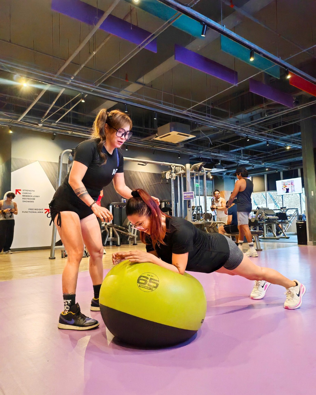 Anytime Fitness SM City Trece Martires Facebook ad: Reach your goals with Expert Coaches at Anytime…