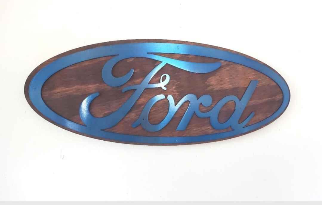 Jason Beamish Facebook ad: Ford Oval metal art on wood wall decor garage sign