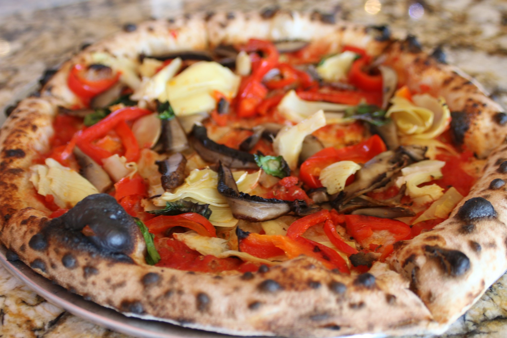 Amore Neapolitan Pizzeria Facebook ad: We make our own dough, sauce, and mozzarella…