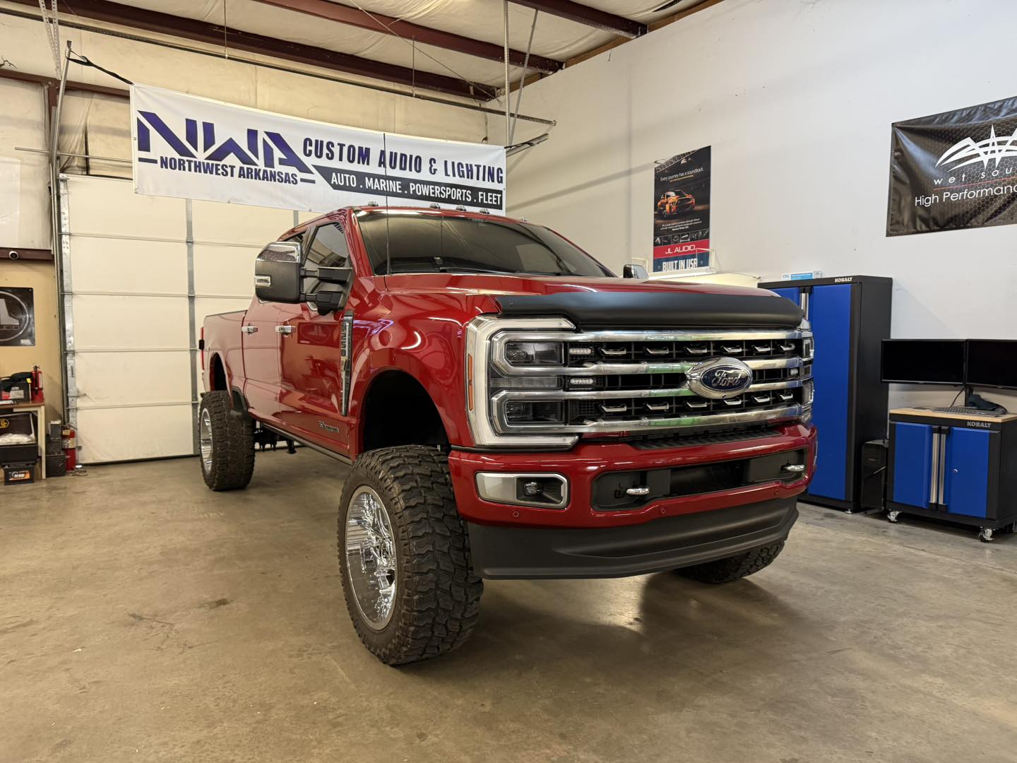 NWA Custom Audio & Lighting Facebook ad: JL Audio Stealthbox for the SuperDuty Crew Cab…