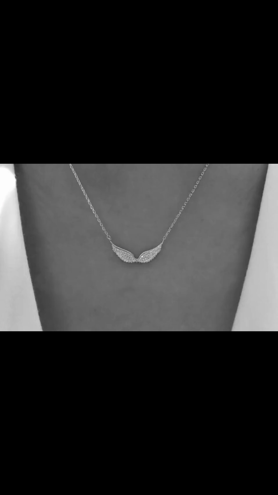 Lunna accessories Facebook ad: Angel wings necklace