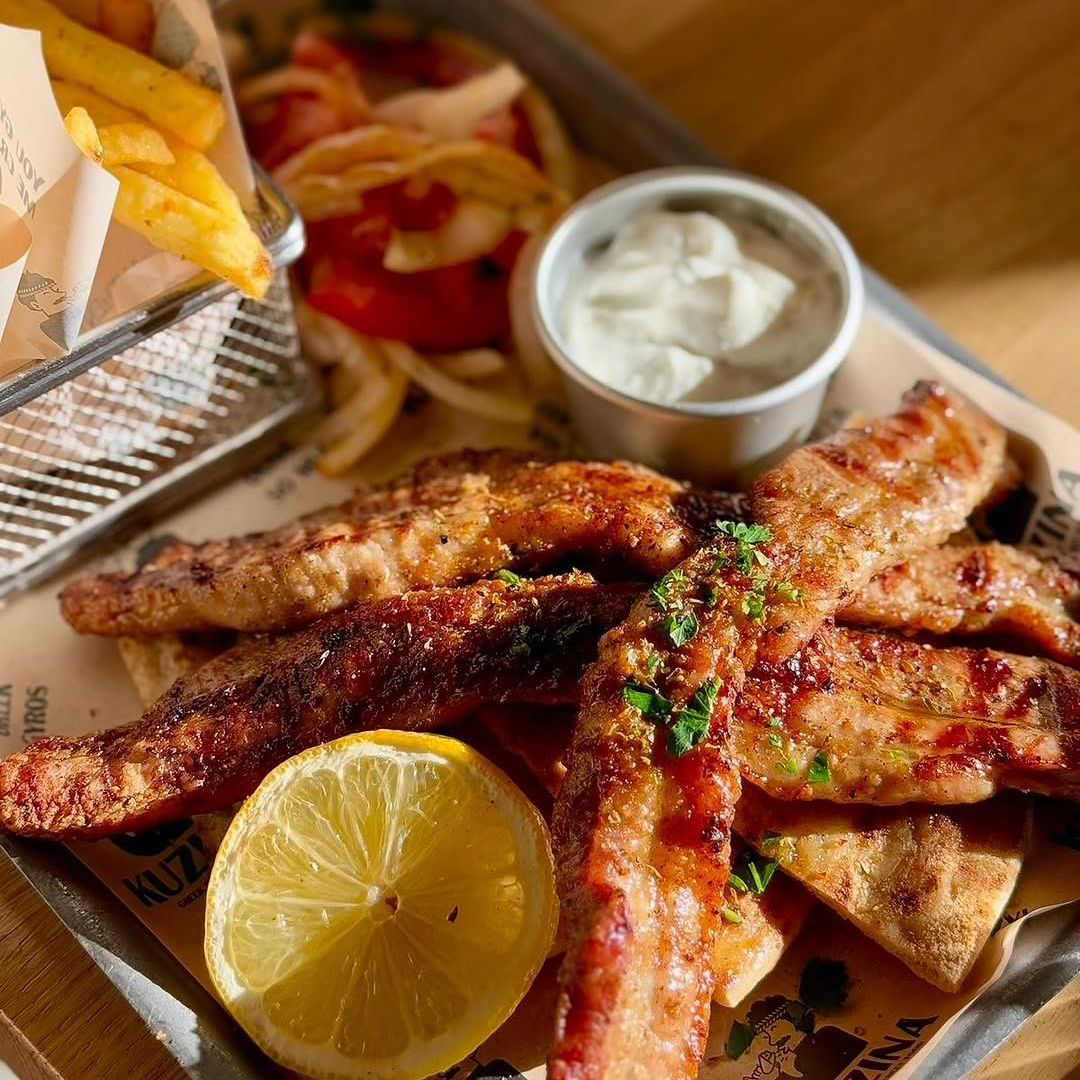 Kuzina Greek Street Food Facebook ad: Book Kuzina, the best alternative to Greece.