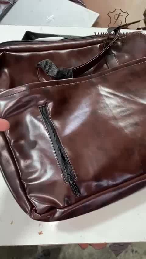 Zamora Crafts Facebook ad: Premium Leatherite Laptop Bag, sleek design, strong build…