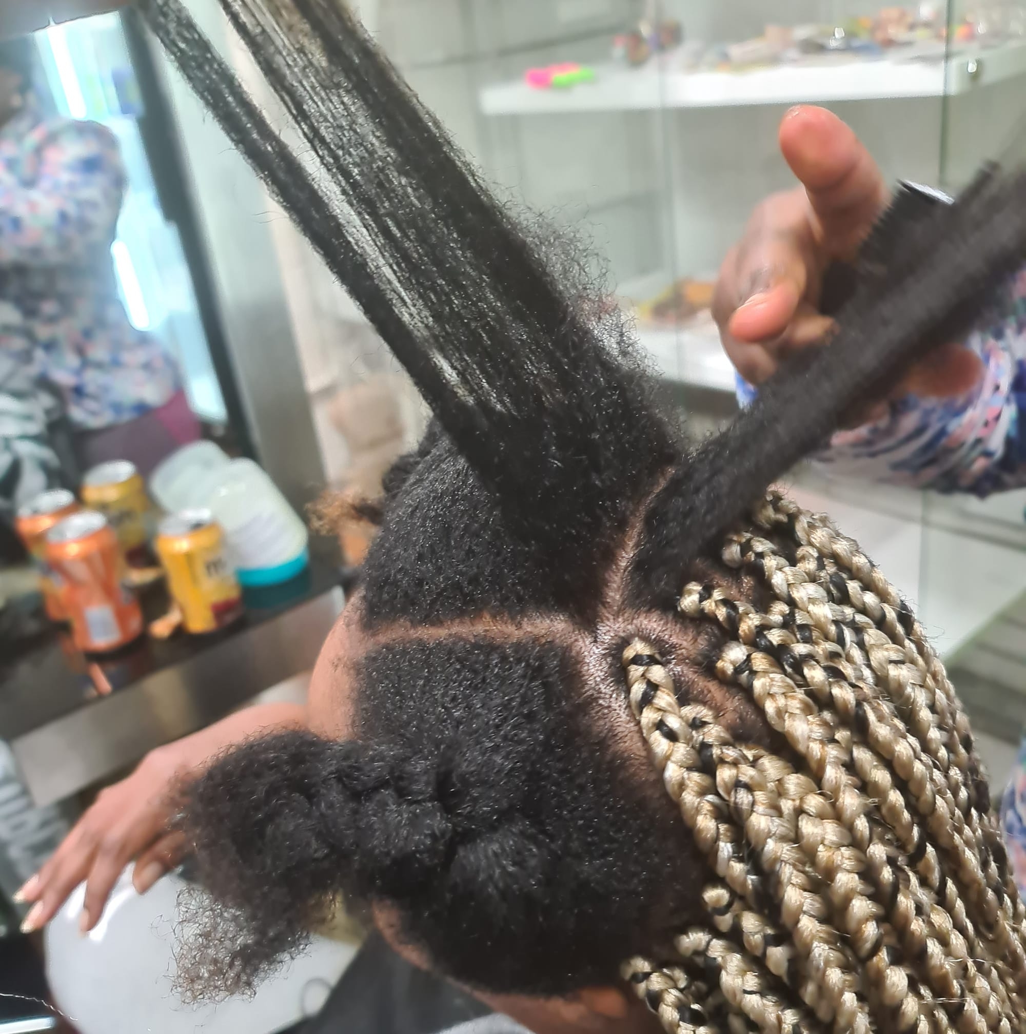 Cornrows & Hair extensions Facebook ad: Chat in Messenger