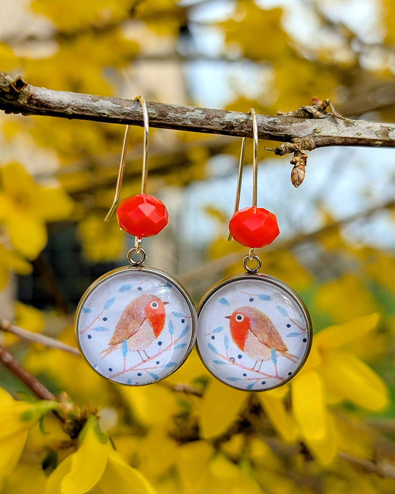 La parenthèse enchantée Facebook ad: Bijoux illustrés et fabriqués par un couple de…