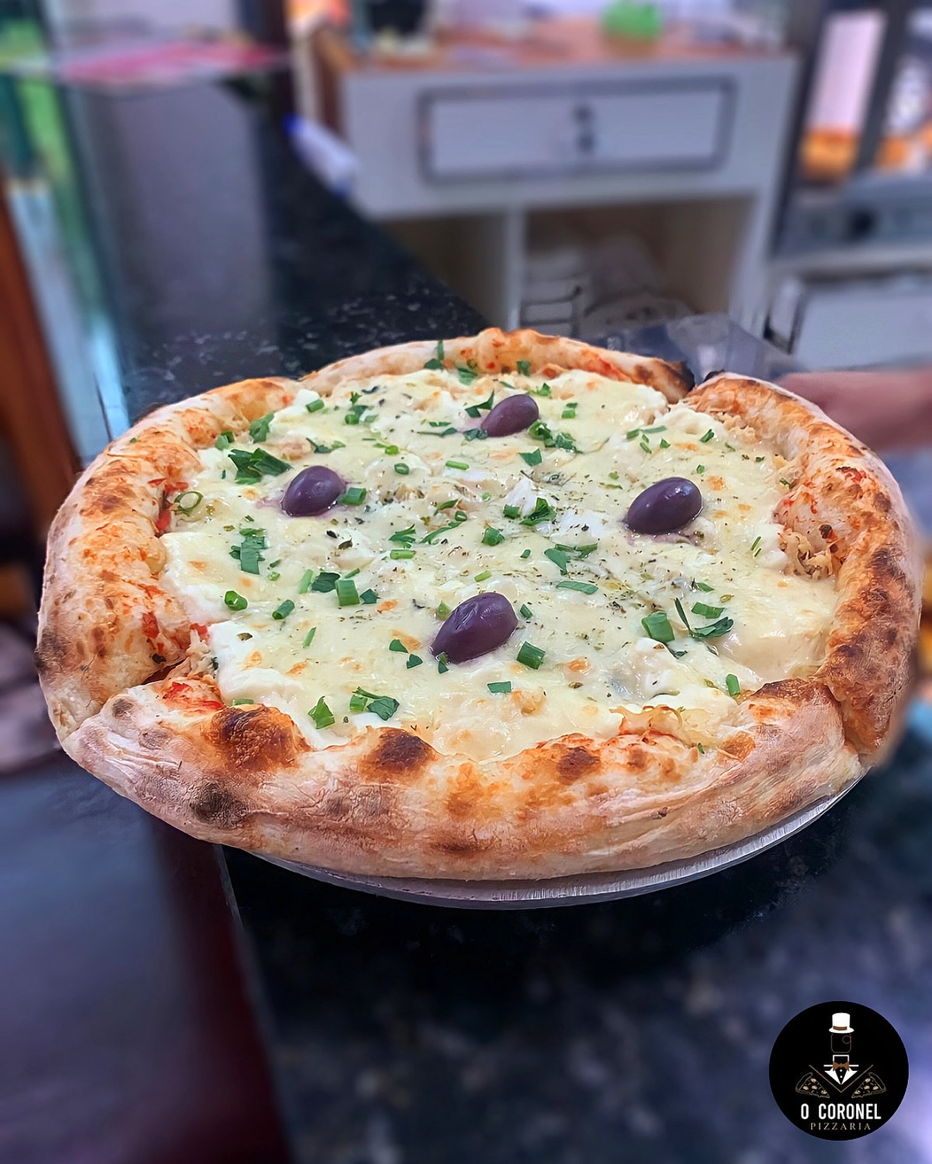 O Coronel Pizzas Bragança  Facebook ad