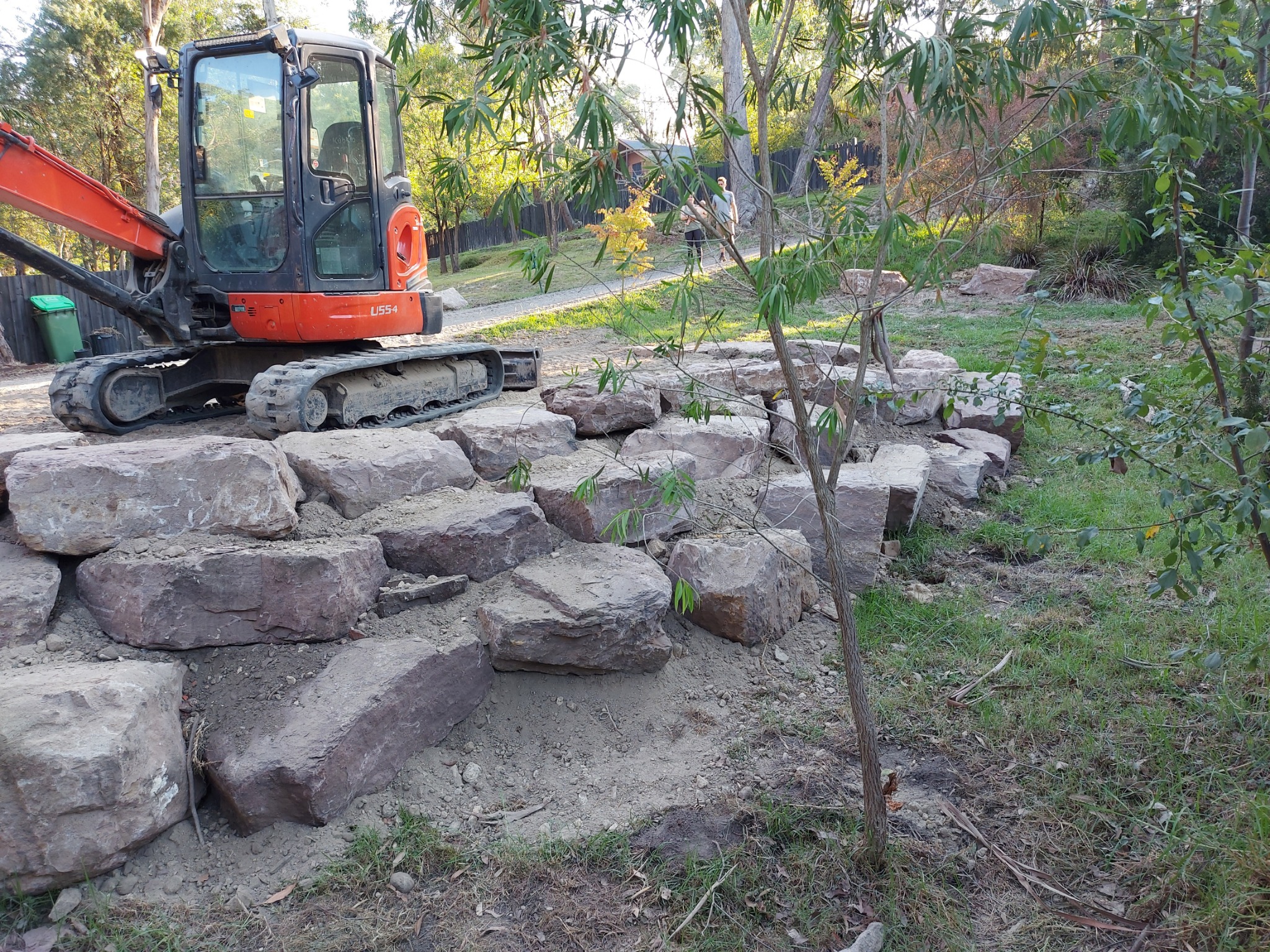 TR Construction and Earthworks Facebook ad: Transform your property with a natural rock retaining…