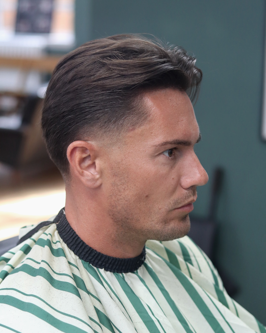 Rain Dogs Society - Bespoke Barbers. Facebook ad from Feb 2, 2026