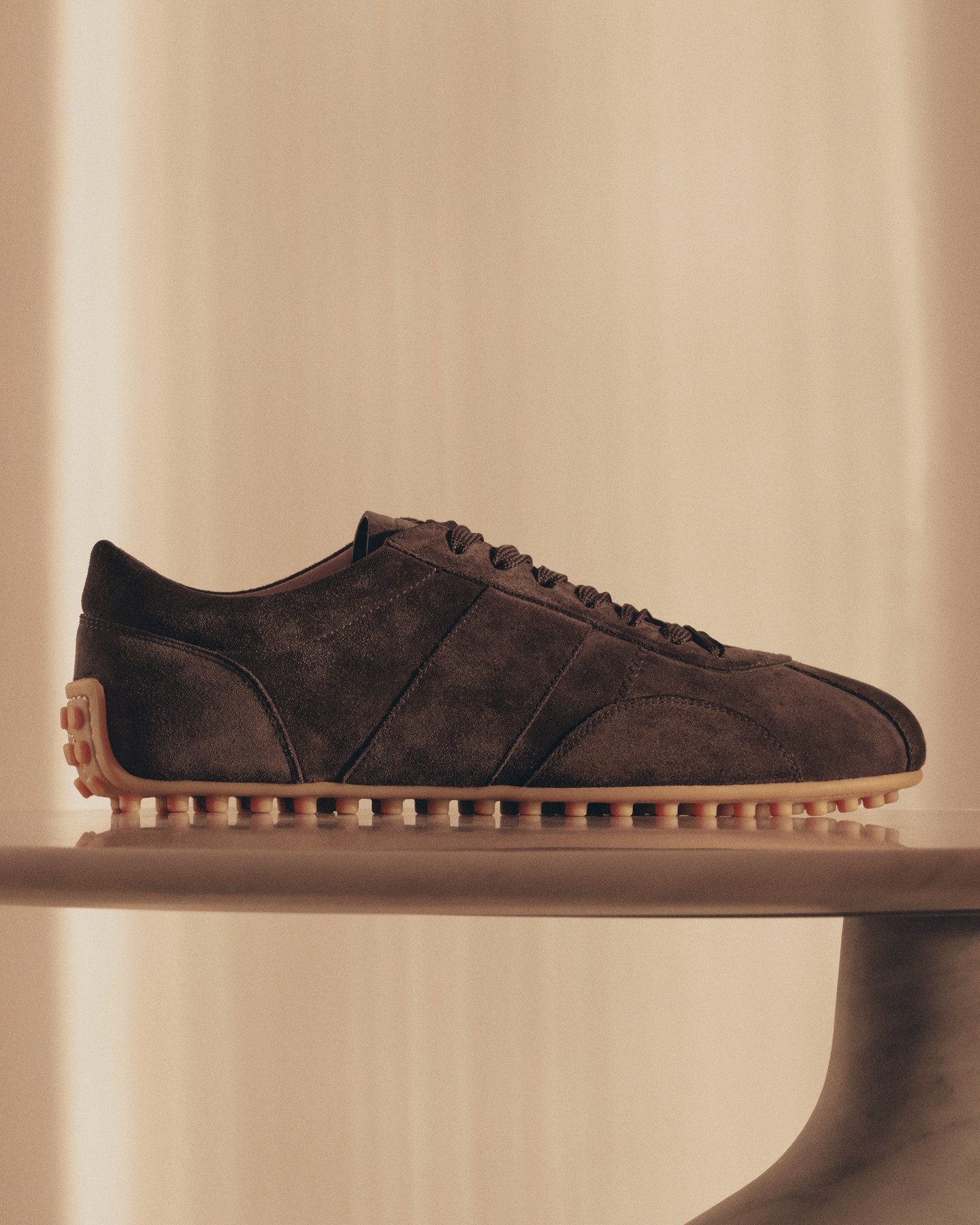 Tod's Facebook ad: The T-Marathon sneaker stars in the Tod’s Spring-Summer…