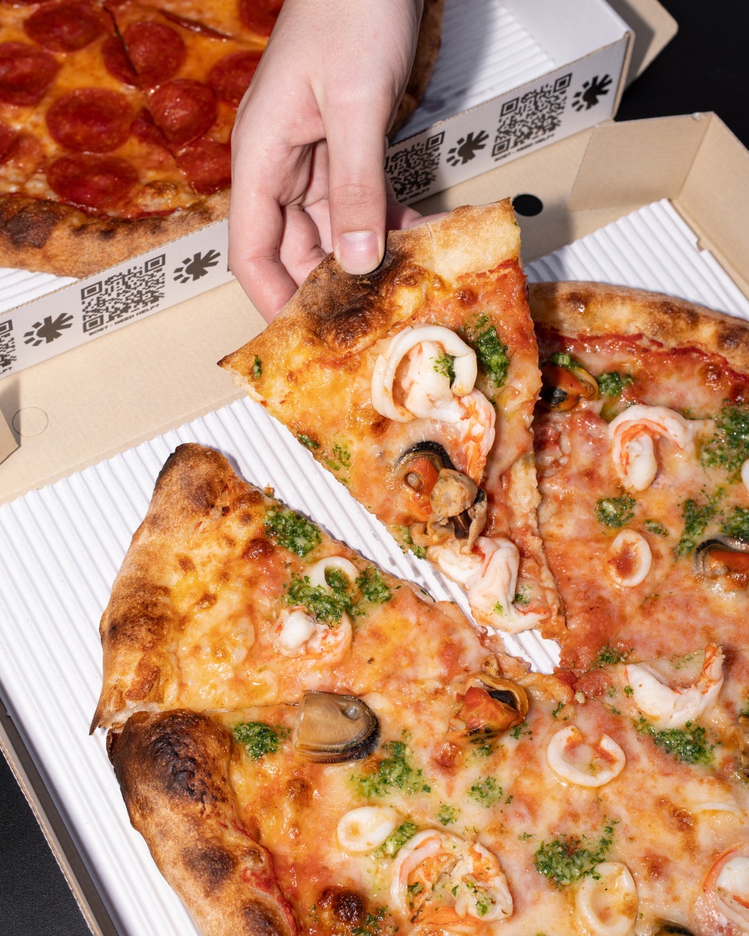 Ballistic Pizza Facebook ad: Seafood pizza, straight from the deep end of…