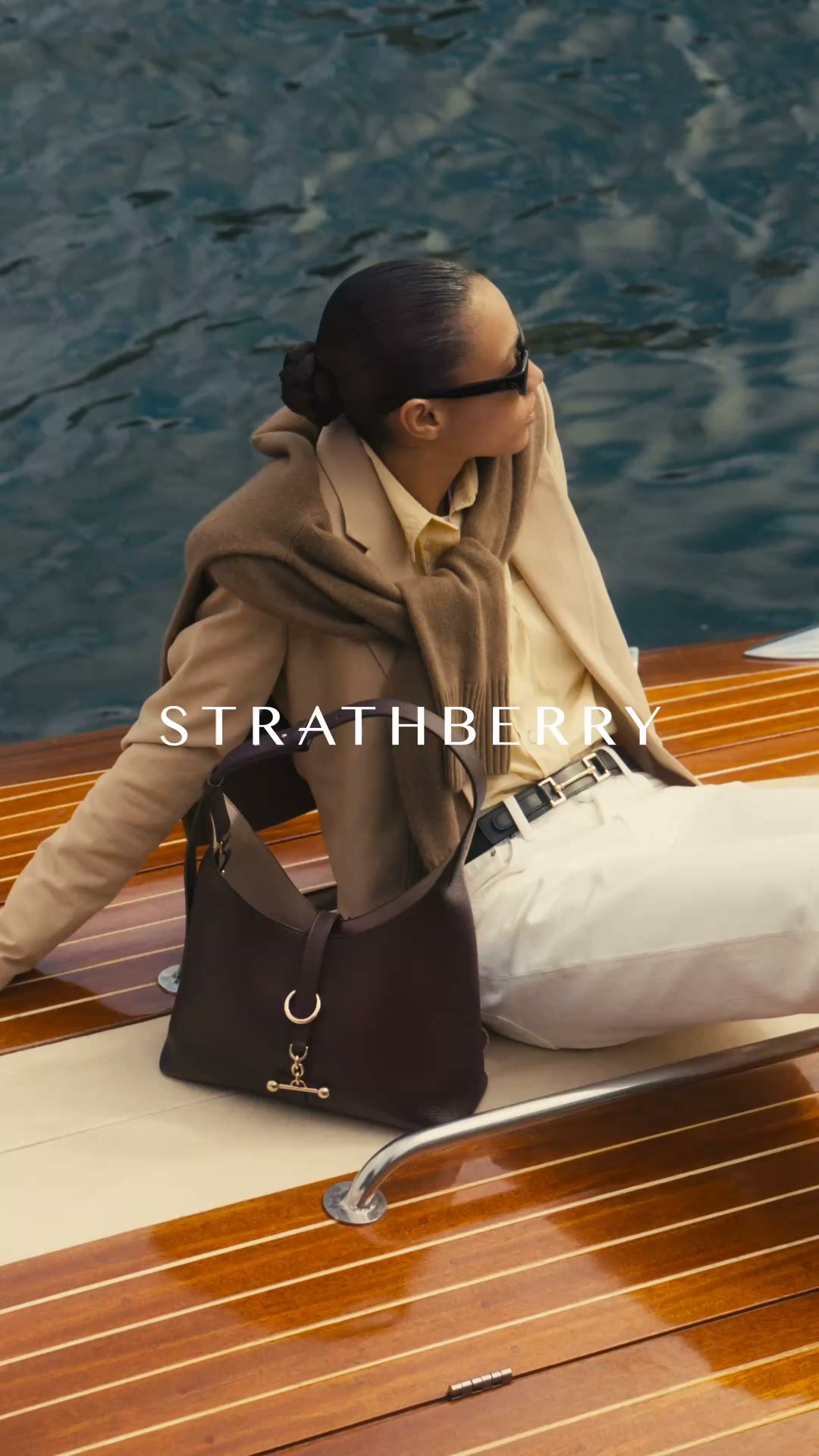 Strathberry Facebook ad: Introducing Burgundy by Strathberry.