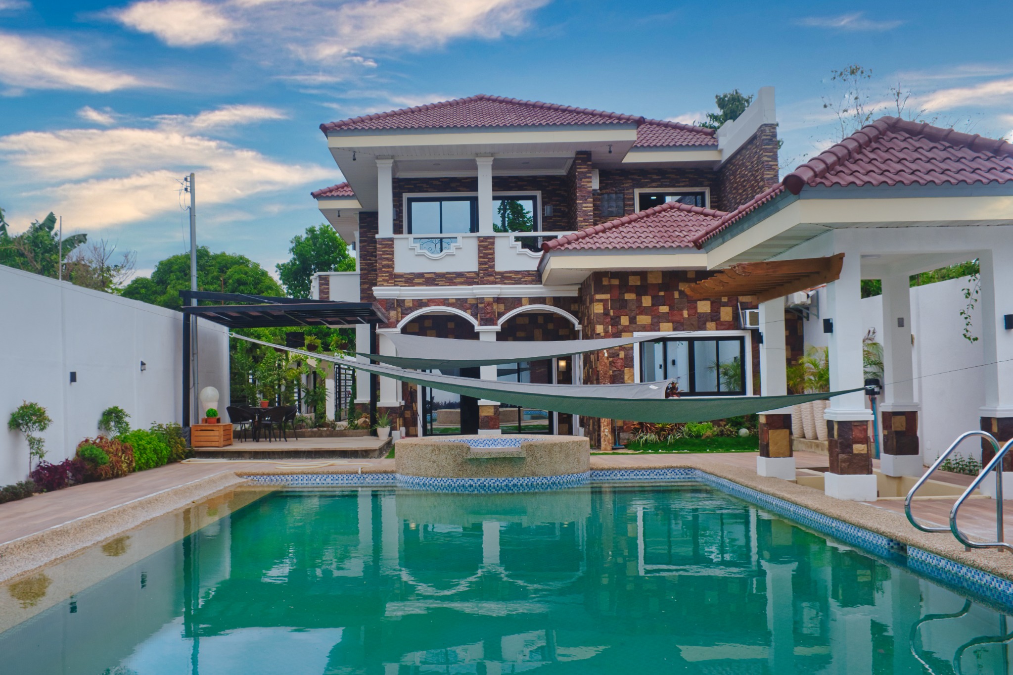 Villa de Ciudad Facebook ad: Enjoy a relaxing getaway at our 4-room vacation…