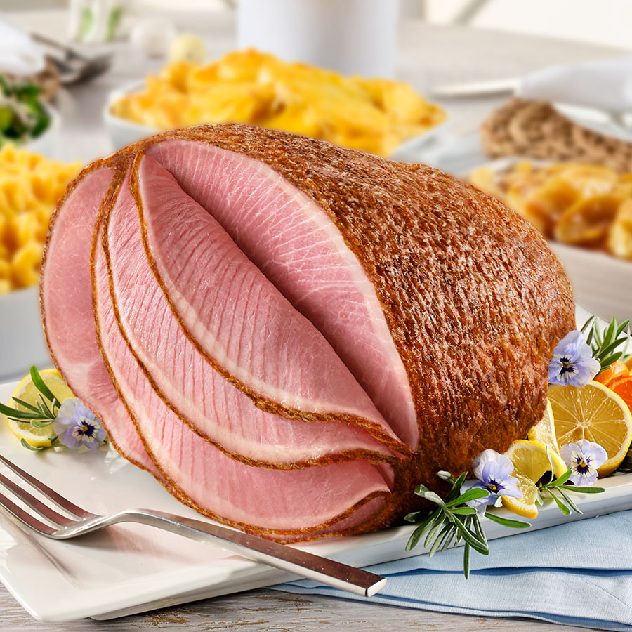The Honey Baked Ham Company Facebook ad: The World's Best is at HoneyBaked.