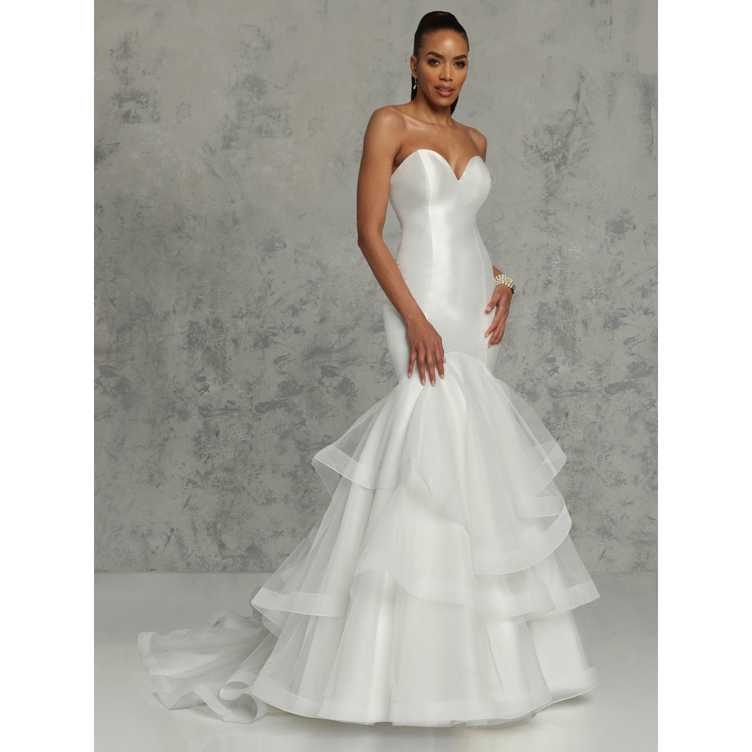 Avery Austin Facebook ad: Who says your dream wedding dress has to…