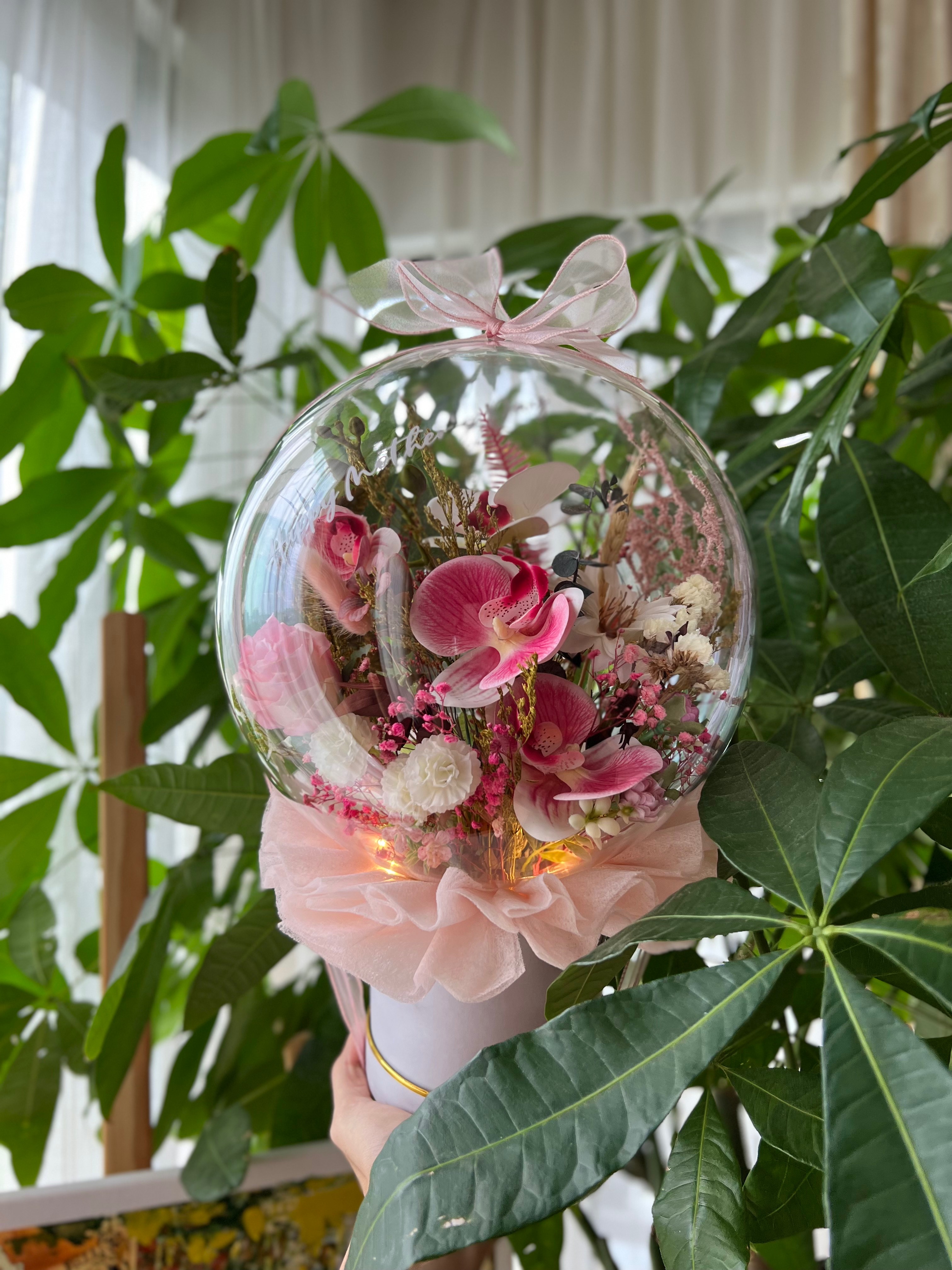 Blossoms.kl Facebook ad: Looking for long lasting gift that is unique…