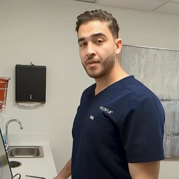 Nuvia Dental Implant Center Facebook ad: NEW: Dental Implant Pricing Guide