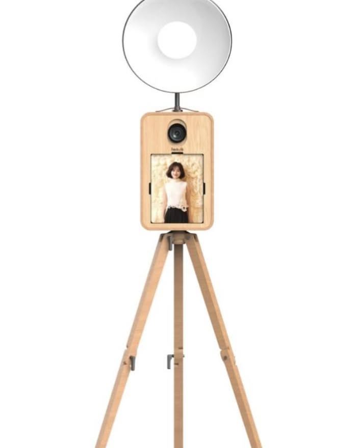 Crysthal Melendez Facebook ad: Wooden Photo Booth Rental DSLR