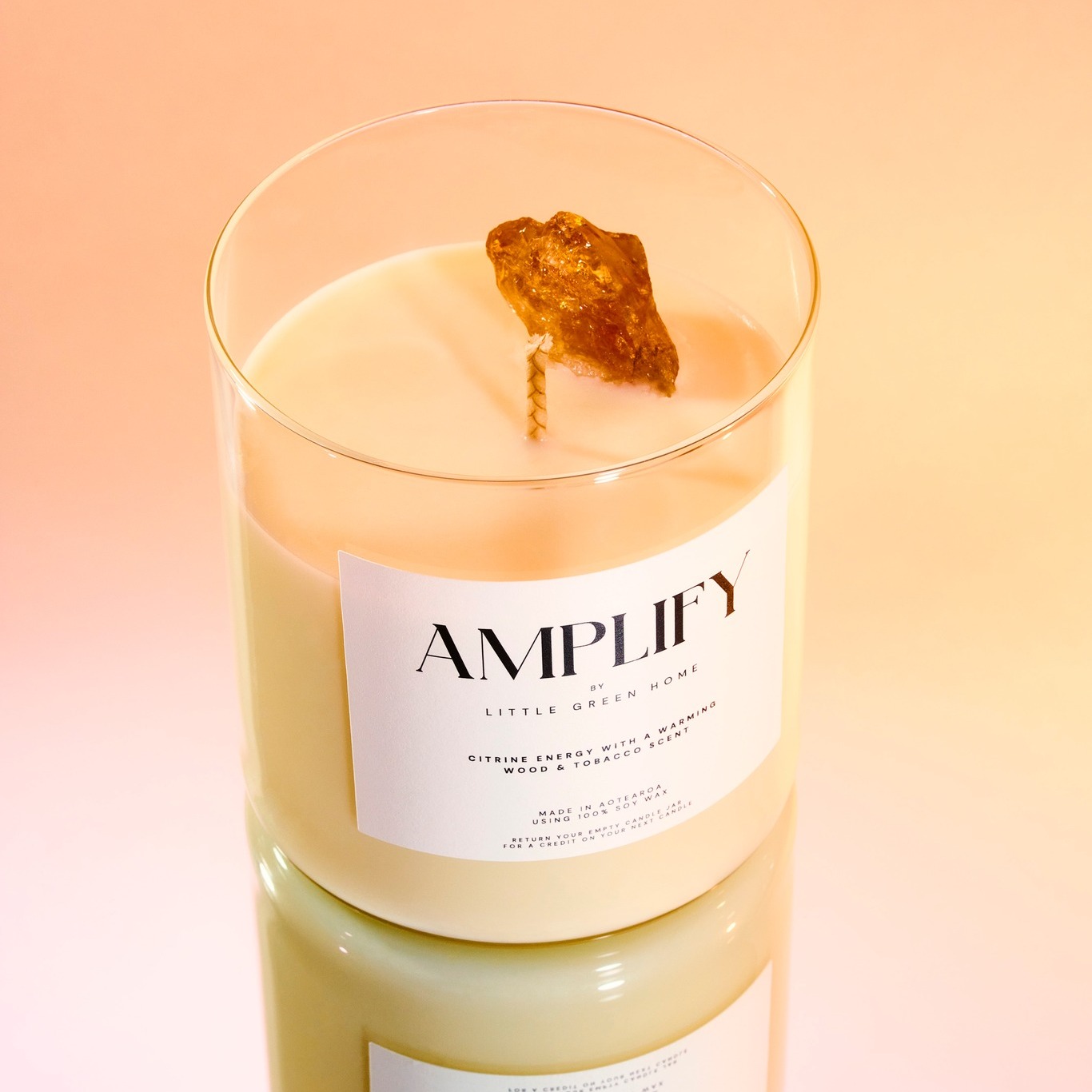 Little Green Home Facebook ad: Crystal Candle Amplify Energy
