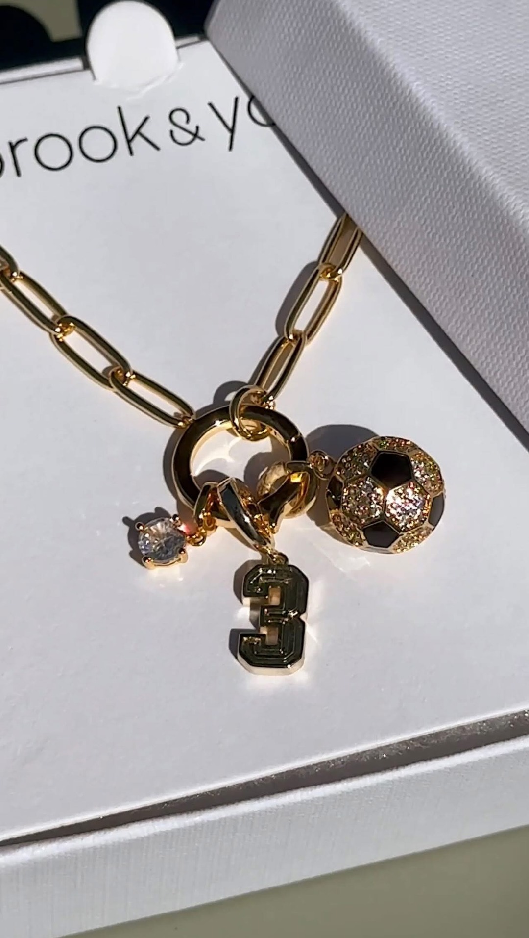 brook & york Facebook ad: Proud soccer mom energy, but make it jewelry…