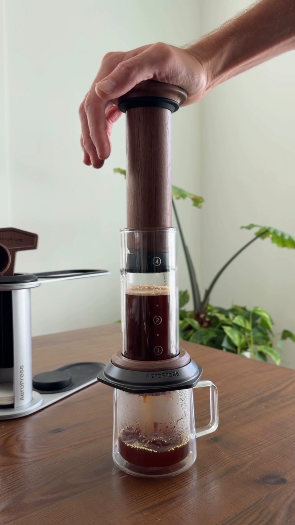 AeroPress Facebook ad: The @aeropress Premium-now in walnut.