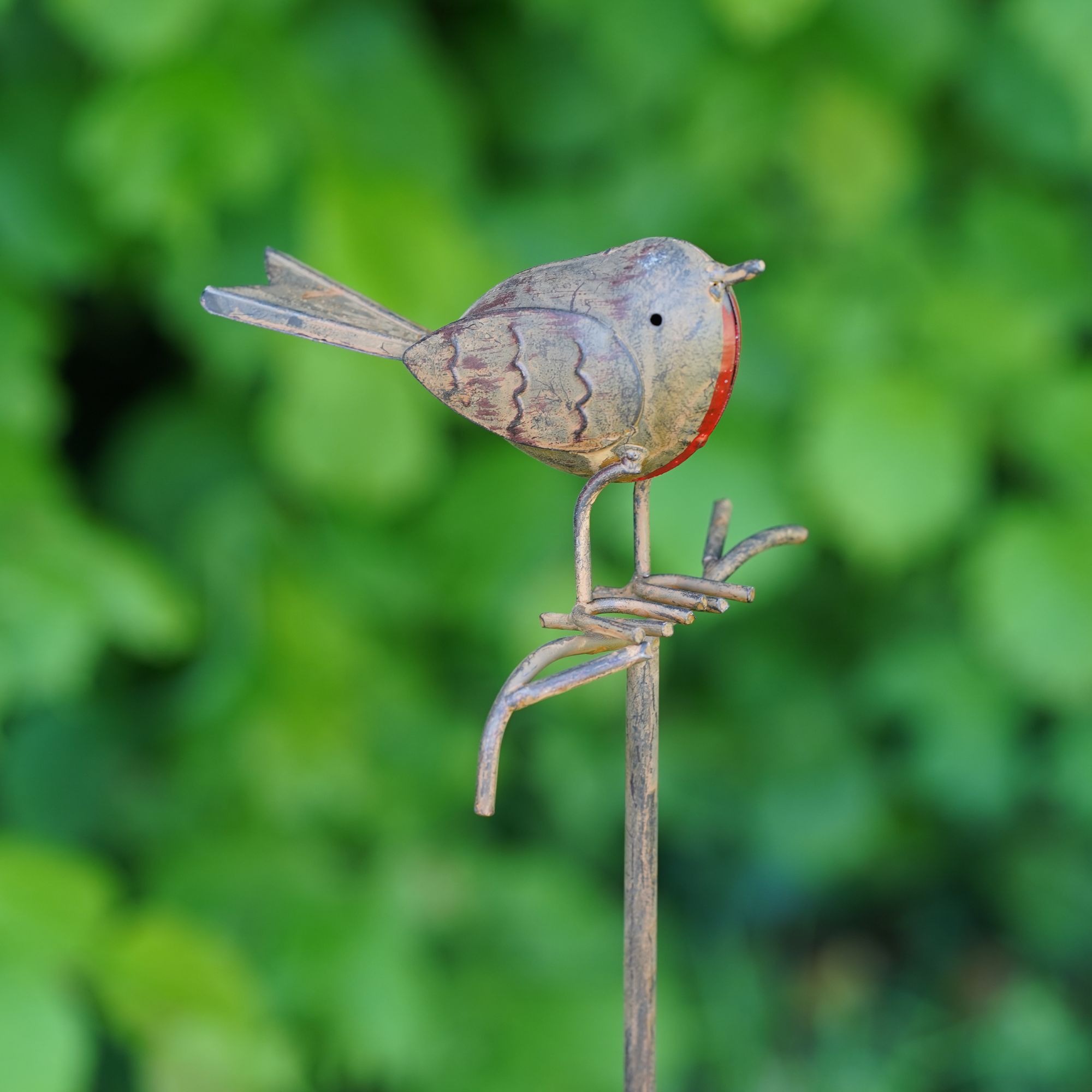 Burgess Home & Garden Facebook ad: Uniquely British birds - these garden ornaments portray…