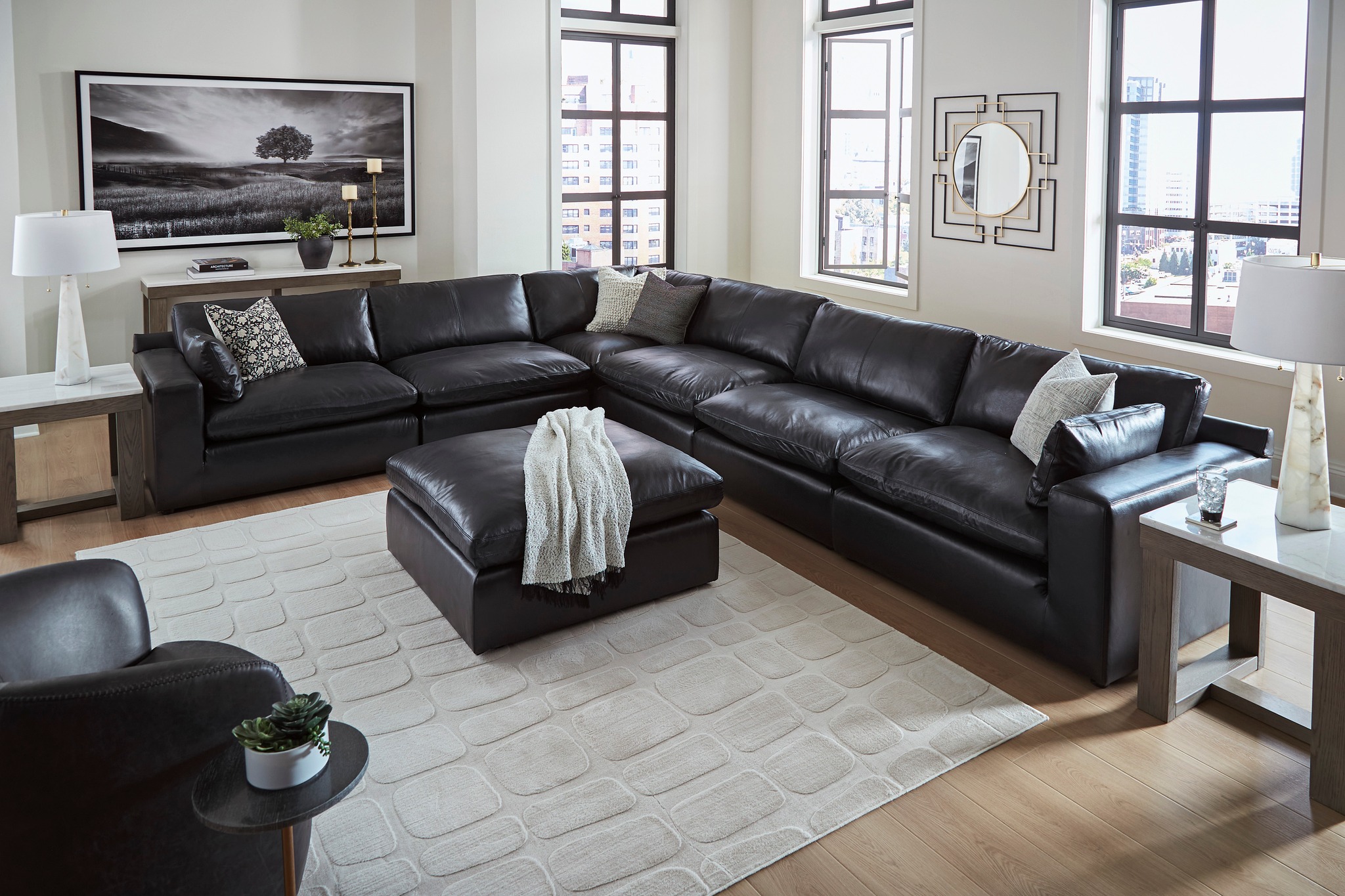 Unique Piece Furniture & Mattress Facebook ad: **THE EMILIA SECTIONAL COLLECTION***