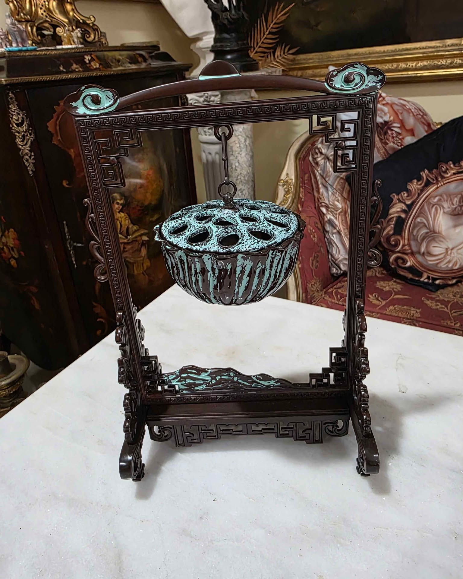 Nadejda Hovhannisyan Facebook ad: Chinese-Style Hanging Lotus Incense Burner with Ornate Stand