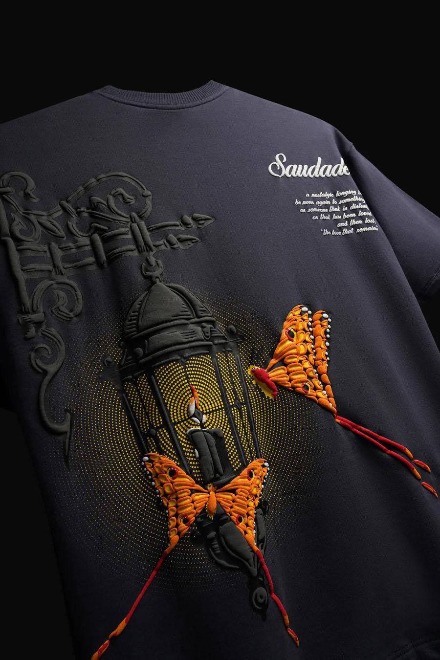 Mulen Facebook ad: The Burning Attraction Tee is a charcoal, heavyweight…