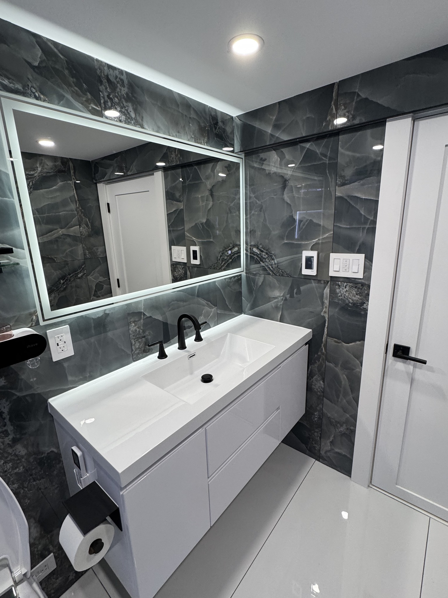 RAO Construction LLC Facebook ad: Thinking about upgrading your bathroom or giving the…
