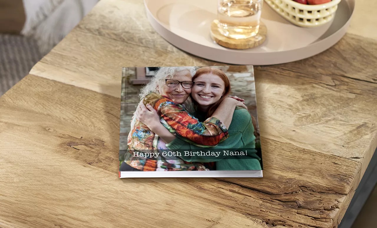 CEWE Facebook ad: A CEWE PHOTOBOOK is a photo album like…