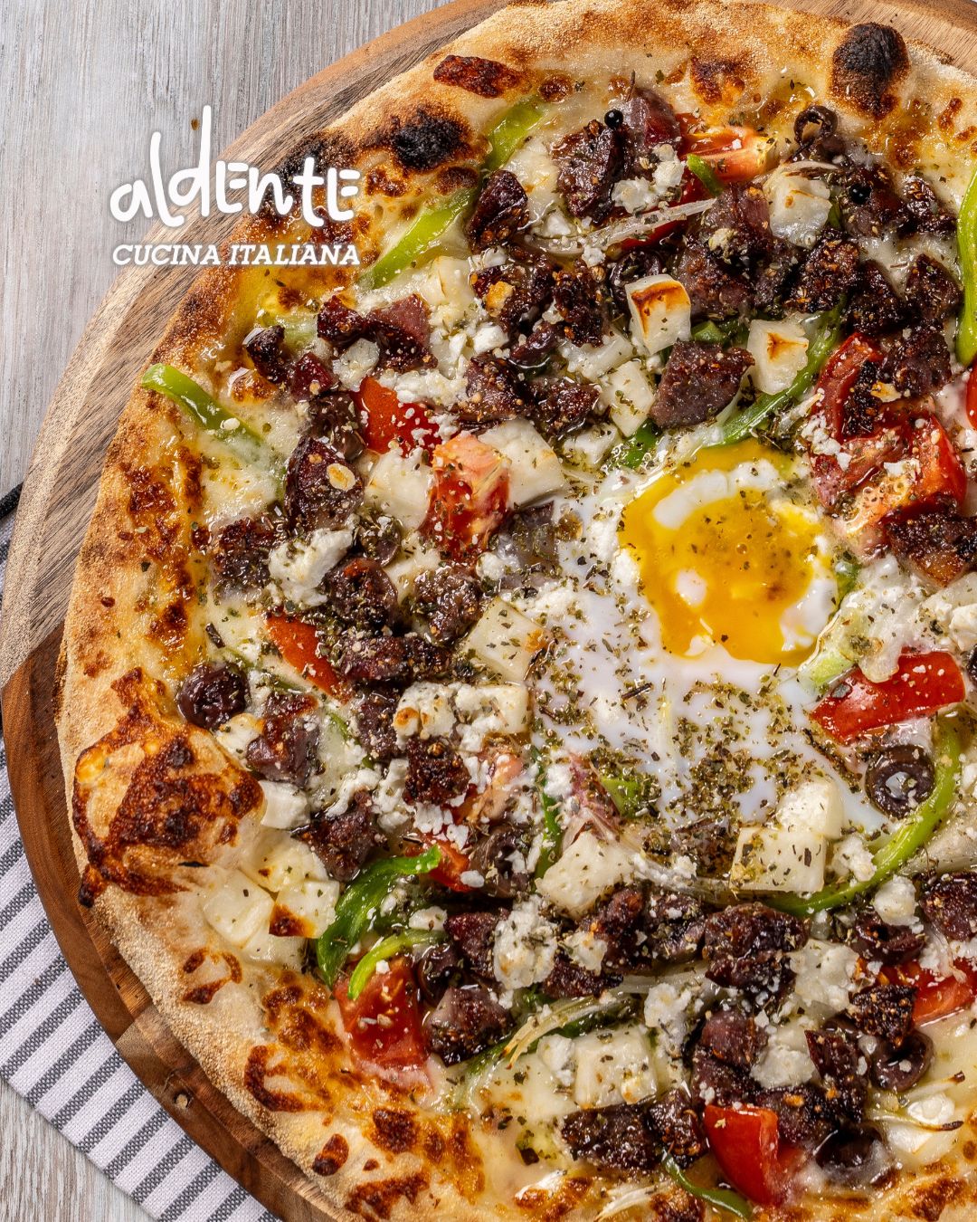 Aldente Larnaca Facebook ad: The Greca: a thoughtfully curated blend of mozzarella…