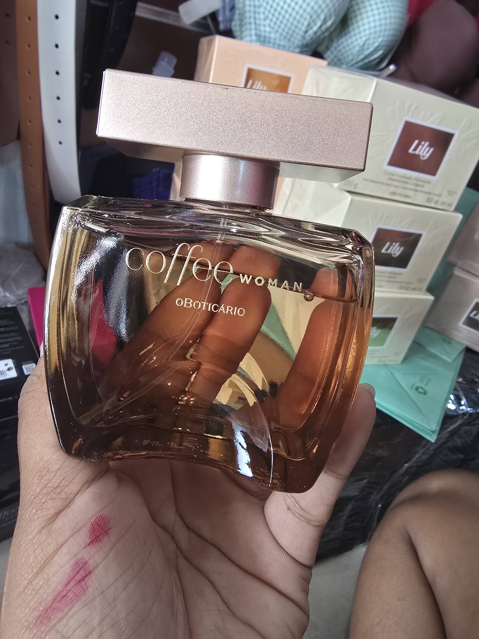 Angie's Cosmetic Shop Facebook ad: Brazilian perfumes, oils and cream available in store.