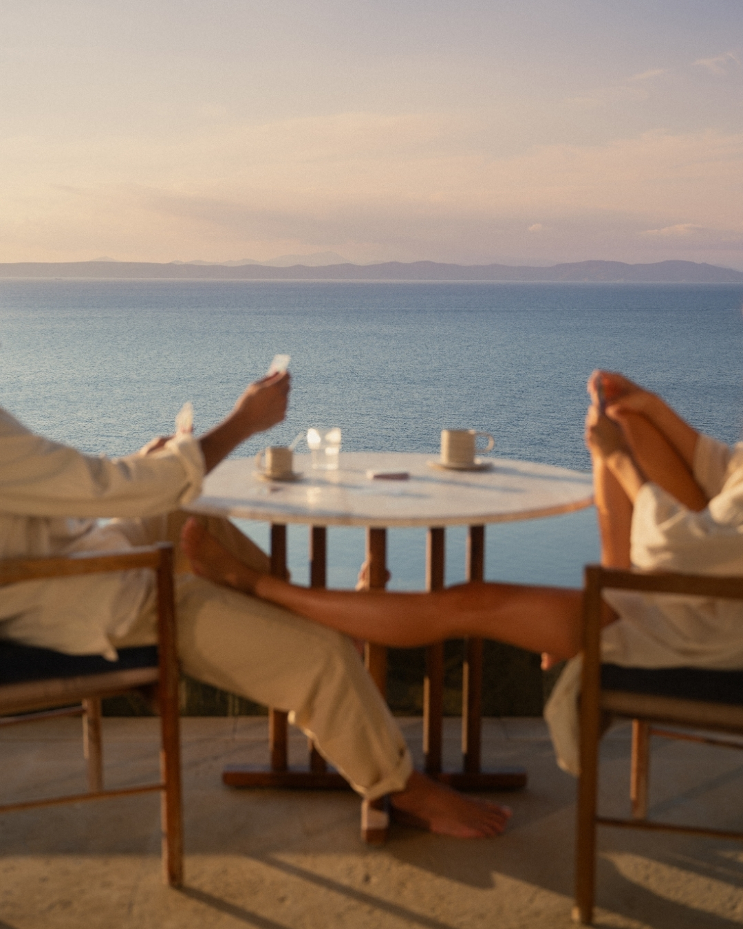 One&Only Kéa Island Facebook ad: Within the privacy of your villa, the table…