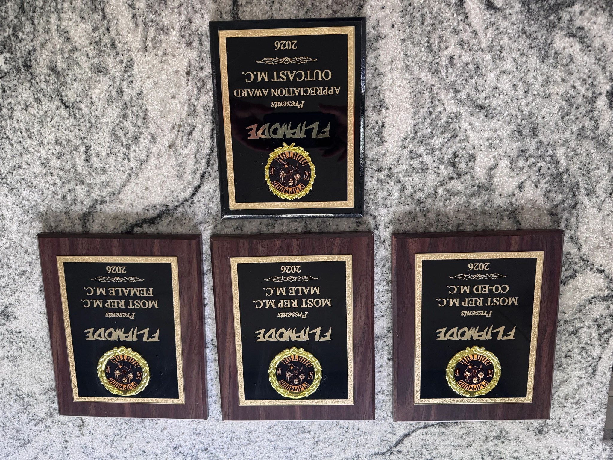 Tomasi's Sports & Awards Facebook ad