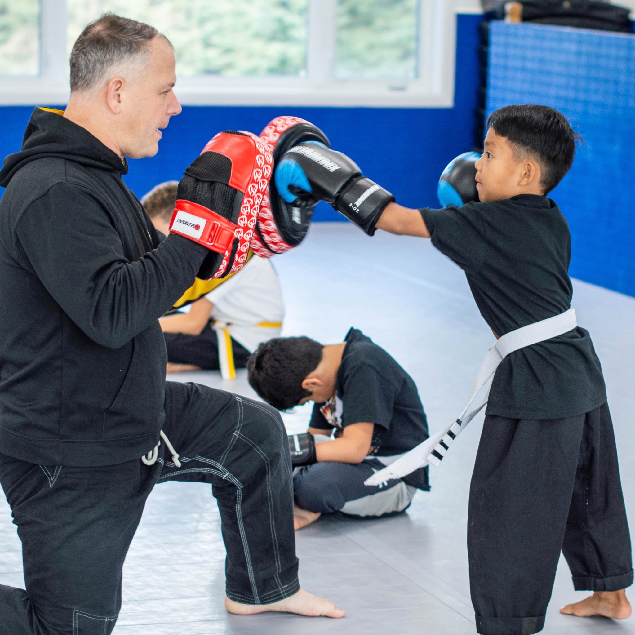Mixed Martial Arts & Fitness Academy Facebook ad: Online Offer! 1 Week of Martial Arts for FREE!