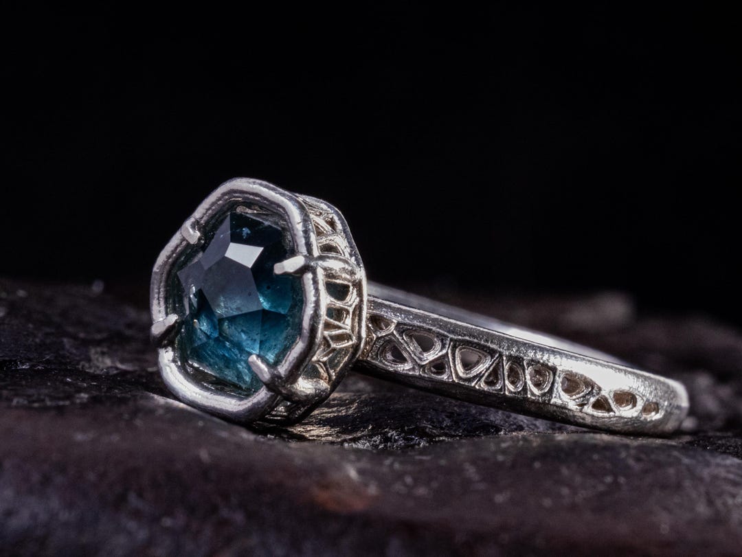 EnchantmentBydesign Facebook ad: Teal Montana Sapphire Ring, Hand-cut Gemstone, Sterling…