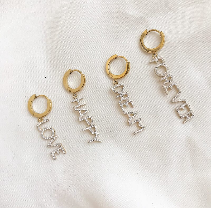 Andromeda Facebook ad: BEST SELLERS EARRINGS by ANDROMEDA