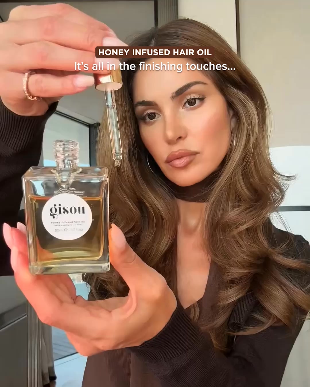 Gisou Facebook ad: Our award-winning Honey Infused Hair Oil for instant…