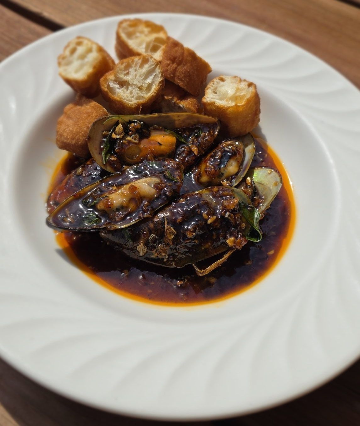 Bann Thai Facebook ad: Spicy Mussels - Spicy Garlic Basil Chili Sauce…